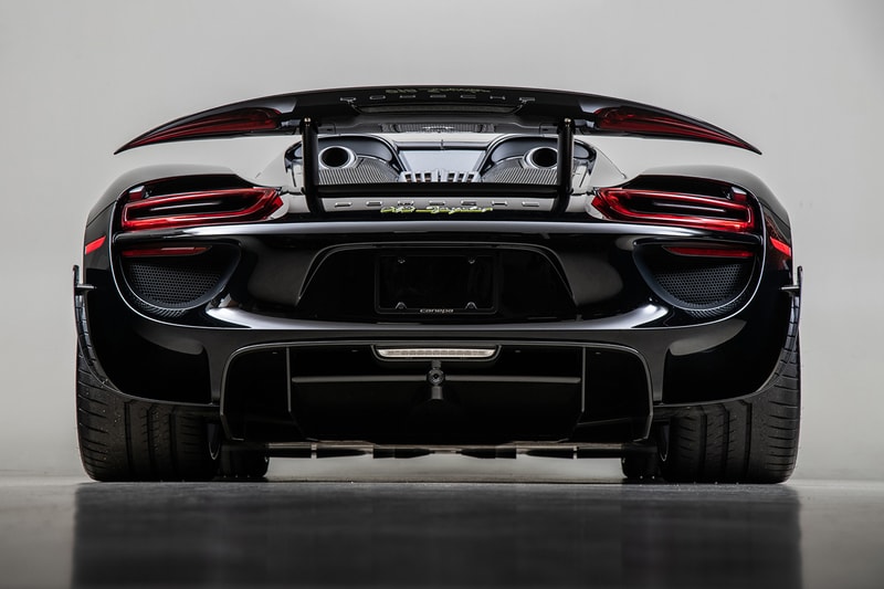 Porsche 918 Spyder Hybrid Onyx Black Silver Accents Environmental Super Car Hypercar Weissach Package 628 miles magnesium motorsport wheels, lighter brake design titanium bolts chassis rear carbon fibre spoilers 214 mph 875bhp 2.4seconds 944 lb-ft torque 4.6ltr V8 Race Engine 