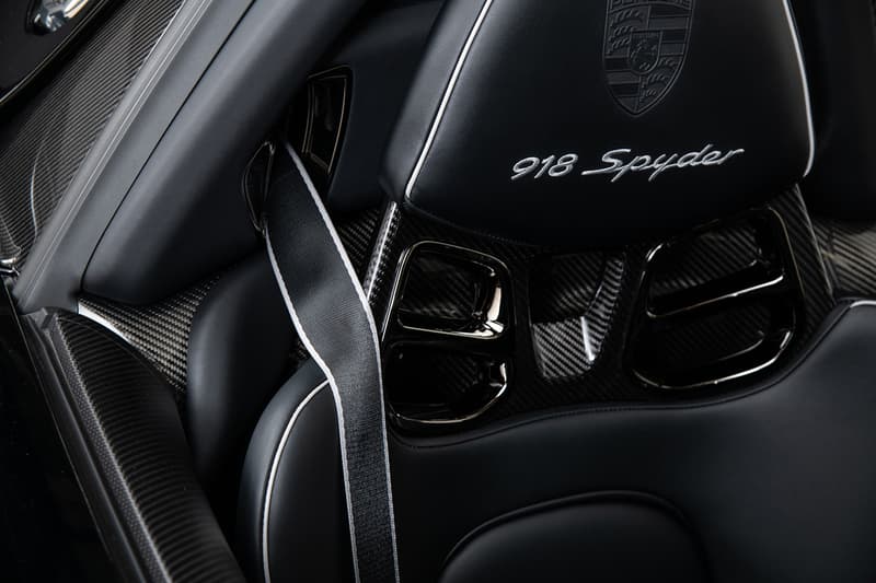 Porsche 918 Spyder Hybrid Onyx Black Silver Accents Environmental Super Car Hypercar Weissach Package 628 miles magnesium motorsport wheels, lighter brake design titanium bolts chassis rear carbon fibre spoilers 214 mph 875bhp 2.4seconds 944 lb-ft torque 4.6ltr V8 Race Engine
