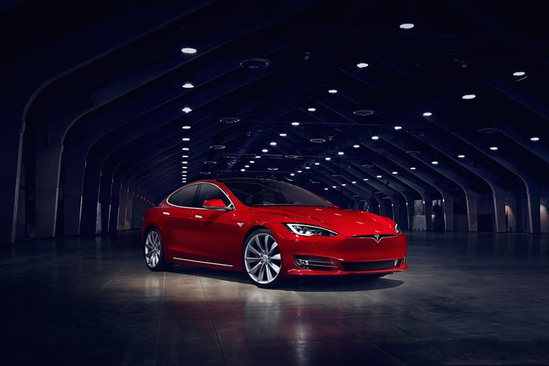 Tesla Model S on Fire in Shanghai Parking Lot Self Destructs Flames Audi A5 Burned Battery Fault investigate team report explode fire garage