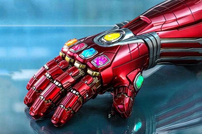 iron man hand with infinity stones