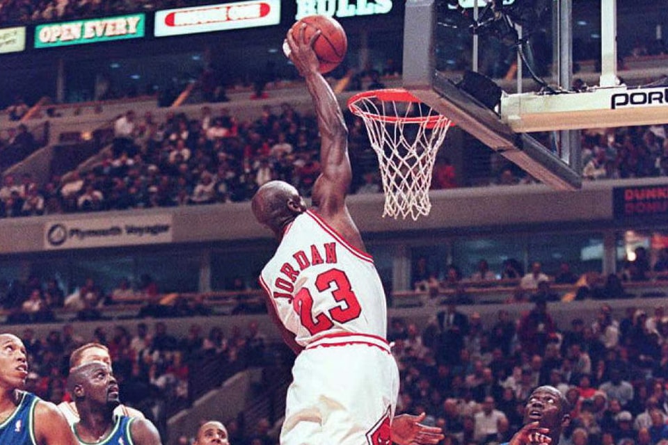 Michael Jordan Breaks Backboard With a Dunk 
