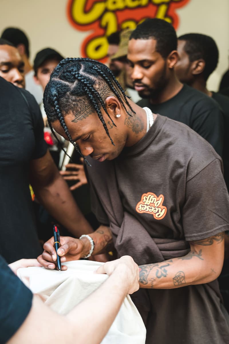 Travis Scott at His Reese's Puffs Paris Pop-Up cereal merch cactus jack