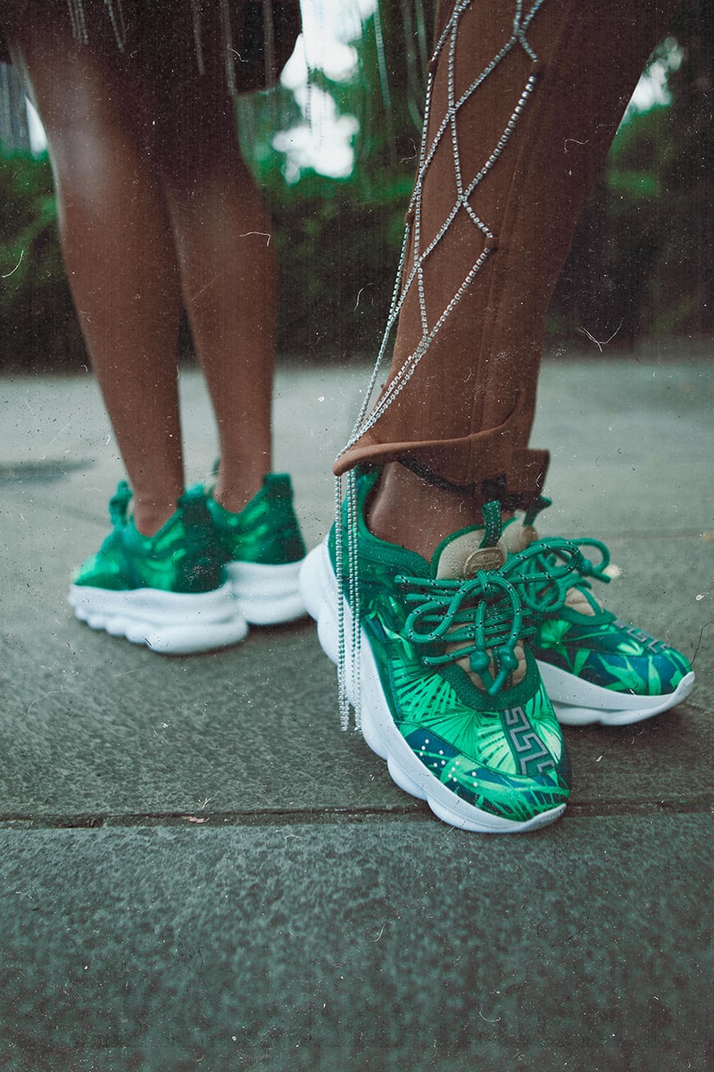 Concepts x Versace Chain Reaction Collaborative Sneaker 2000 Grammy Awards Jennifer Lopez Silk Chiffon Jungle-themed Dress Inspiration Collaboration Lookbook Drop Date Information Release Chunky Shoe High End Italian Fashion House Boston New York
