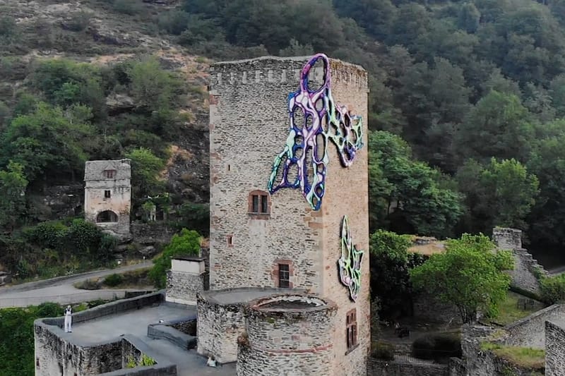 Crystal Wagner’s Colorful 'Ignis Fatuus' Installation Wraps Around Medieval Castle in France
