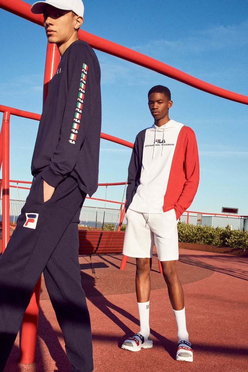 FILA Debuts Exclusive FW19 Heritage Collection  red blue track suits pants jaket drawstring stripe sandal puffer orange trek shoes jeans green red bucket hat jersey track pants italy stripe black bag caryall