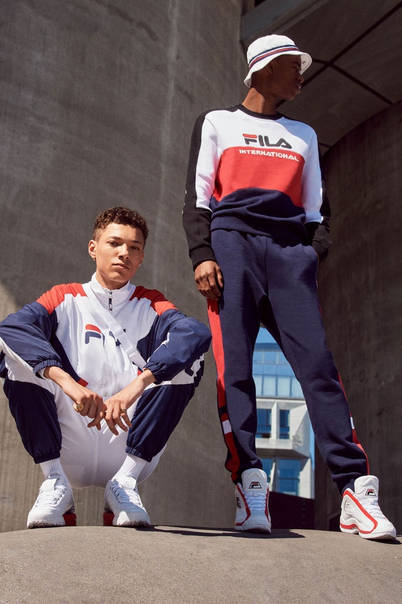 FILA Debuts Exclusive FW19 Heritage Collection  red blue track suits pants jaket drawstring stripe sandal puffer orange trek shoes jeans green red bucket hat jersey track pants italy stripe black bag caryall
