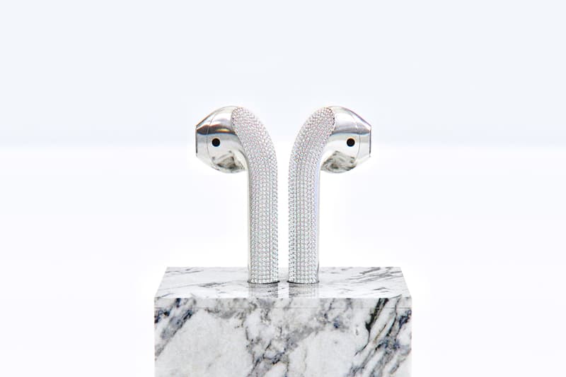 Ian DeLucca Diamond encrusted AirPods White Gold Marble Sculpture New Materialism 20000 usd 