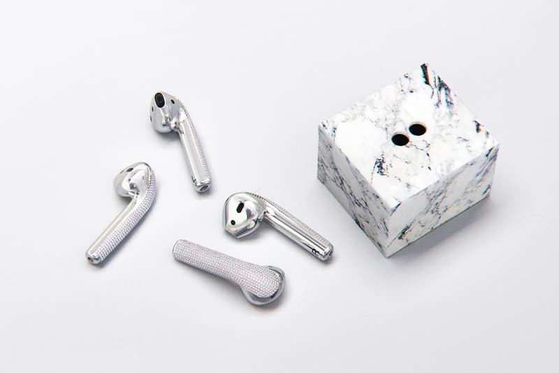 Ian DeLucca Diamond encrusted AirPods White Gold Marble Sculpture New Materialism 20000 usd