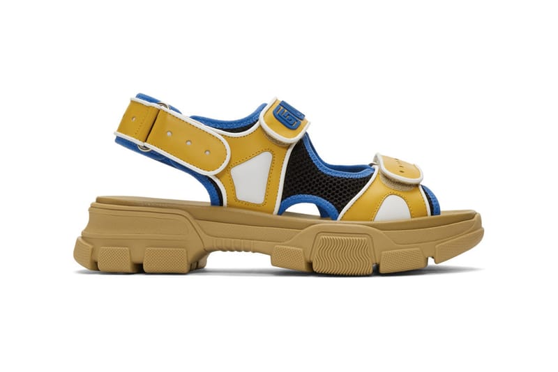 blue and yellow gucci slides