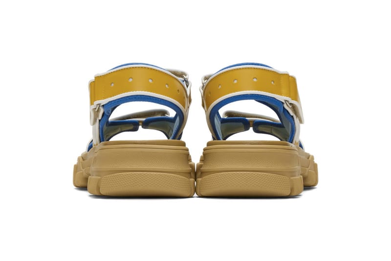 blue and yellow gucci slides