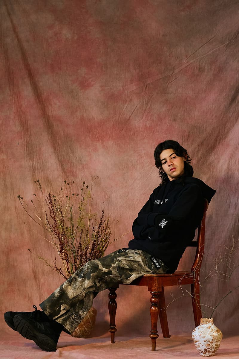 HERESY Fall Winter 2019 FW19 Collection Lookbook Arktis Collaboration "Growing" Folk Nomadic Prints Designs Blanket Scarf Outerwear Coats Camouflage Print Workwear Gloves Hats