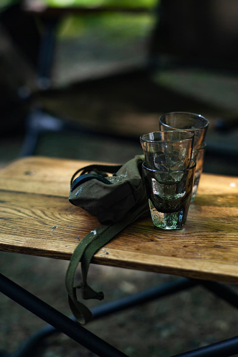 hobo x TRUCK Furniture "Takibi Bar" Season 2 Fashion Apparel Camping Gear Collection Campaign Photography Lookbooks Outdoors Tokyo Japan Paraffin Wax Coated Olive Canvas Items Utility Bag Folding Chair Tote Apron Low Table Pouch Case