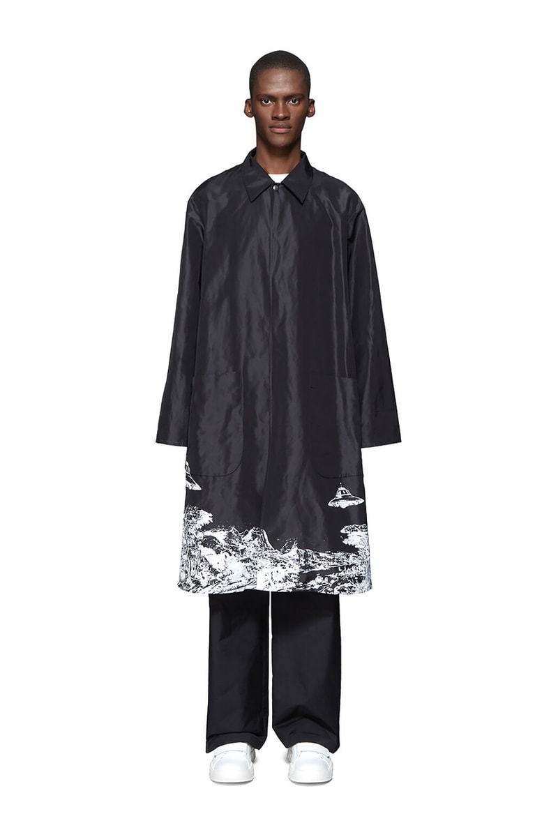 Valentino Time Traveller Coat in Black Logo Trench Coat in Beige graphics ufo flying saucers white red serif font undercover cape concealed central opening 