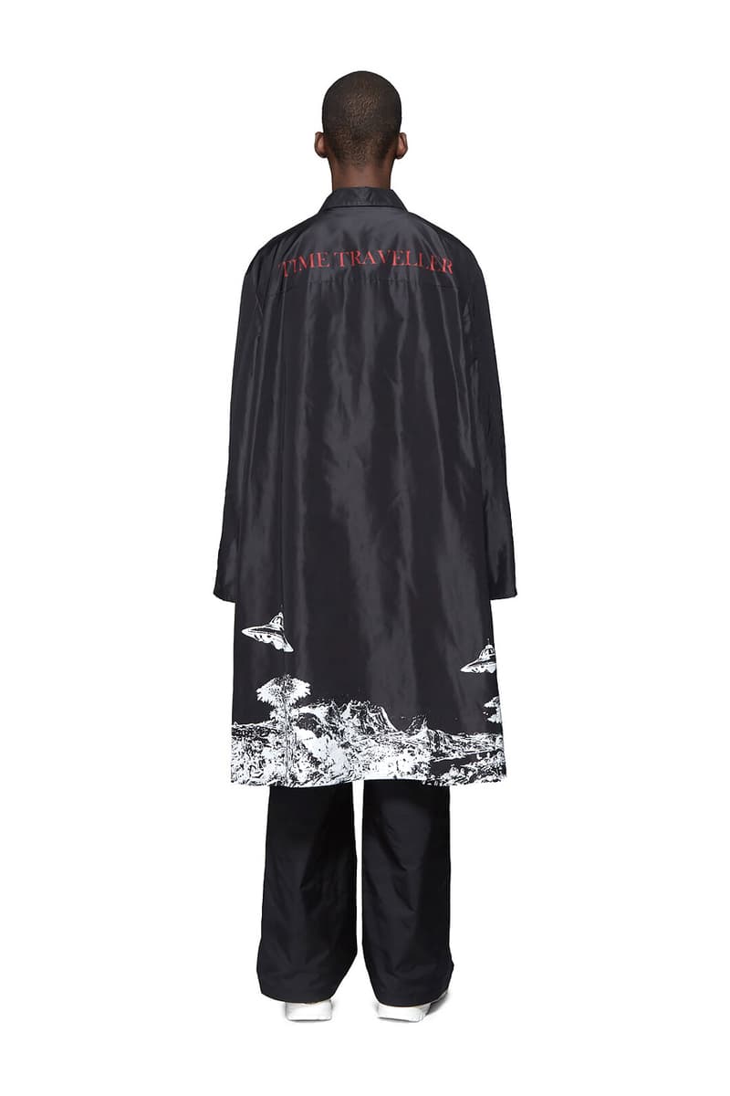 Valentino Time Traveller Coat in Black Logo Trench Coat in Beige graphics ufo flying saucers white red serif font undercover cape concealed central opening