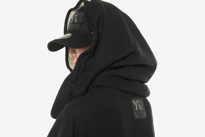 Ys New Era Capsule Collection Yohji Yamamoto black tracksuit backpack napsack tenical hoodie cap graphics monocrhomatic black apparel garments Release info Date