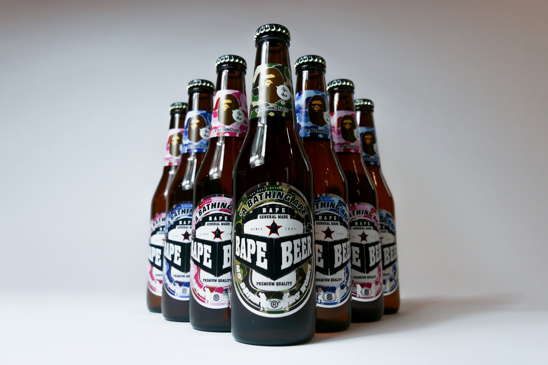 A Bathing Ape Is Giving out Free BAPE Beer japan camo ape head green pink blue