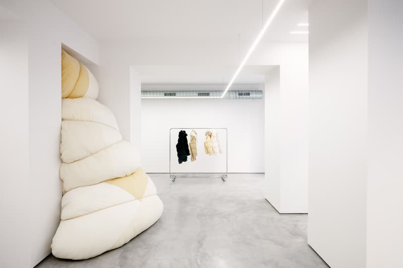 Jil Sander via sant andrea store milan installation space rotating exhibitions monthly gallery luke lucie meier creative director down jackets 