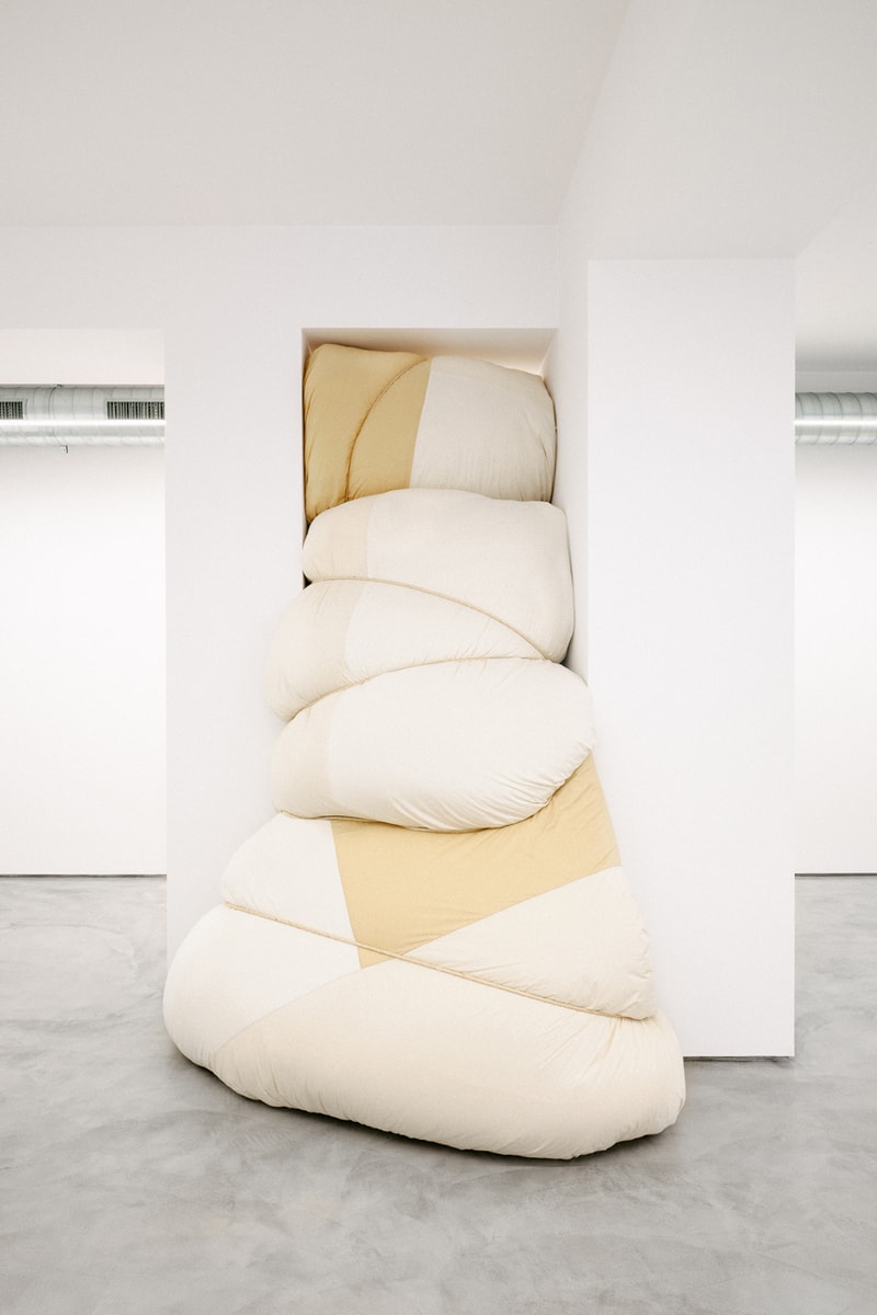 Jil Sander via sant andrea store milan installation space rotating exhibitions monthly gallery luke lucie meier creative director down jackets 