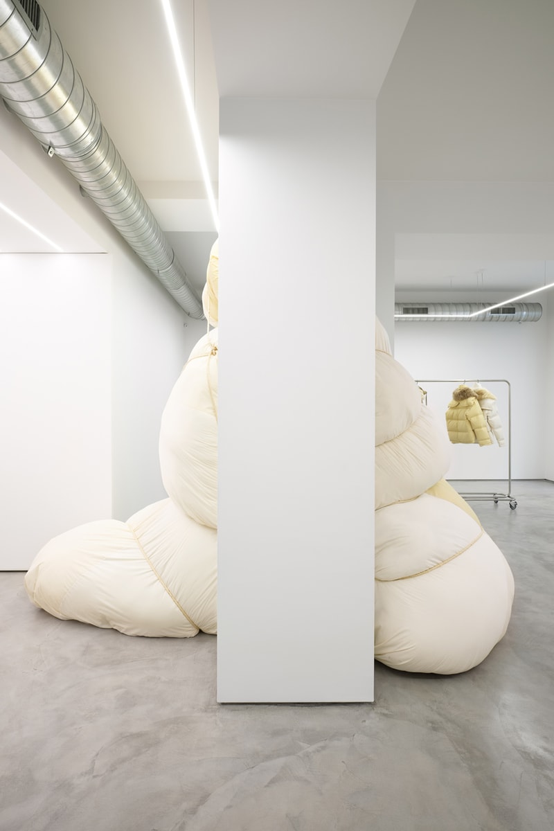 Jil Sander via sant andrea store milan installation space rotating exhibitions monthly gallery luke lucie meier creative director down jackets 