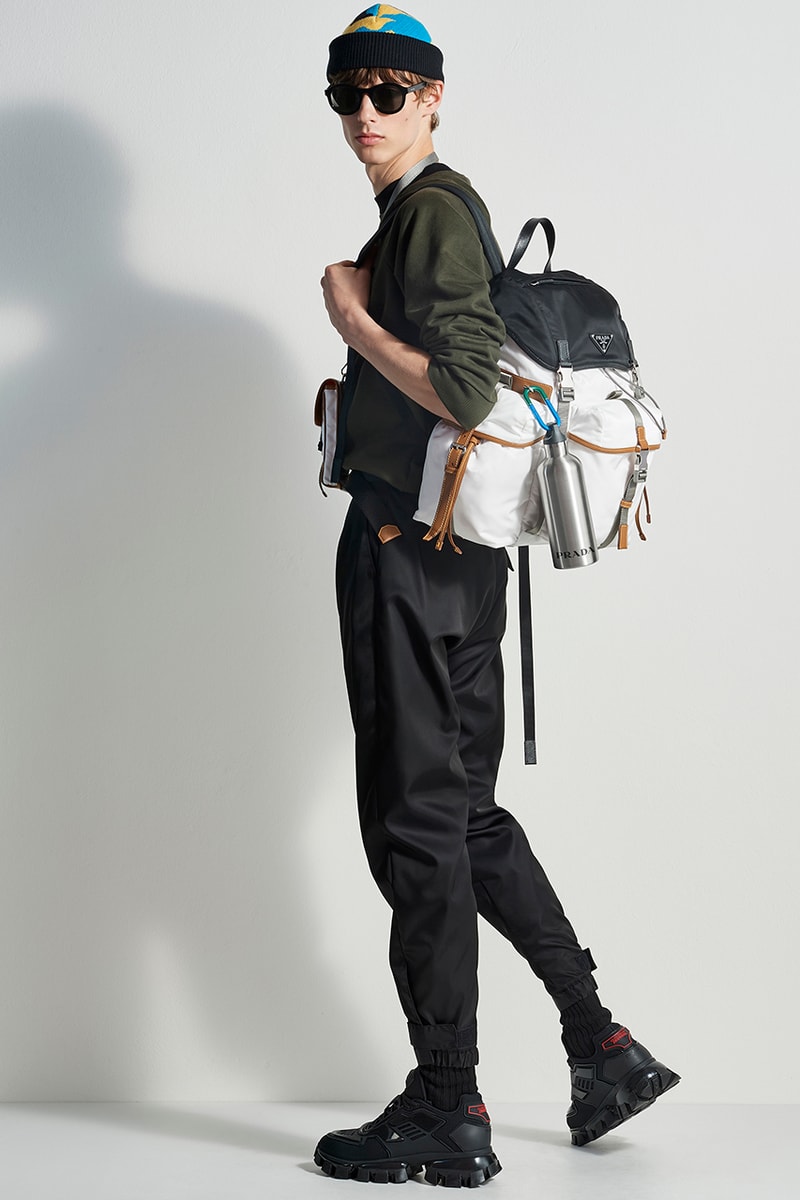 prada escape selfridges apparel sneakers camouflage shirts boots accessories water bottles outdoor practical themed design store space first look buy cop purchase