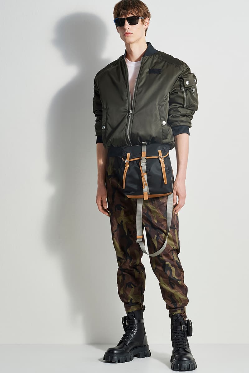 prada escape selfridges apparel sneakers camouflage shirts boots accessories water bottles outdoor practical themed design store space first look buy cop purchase