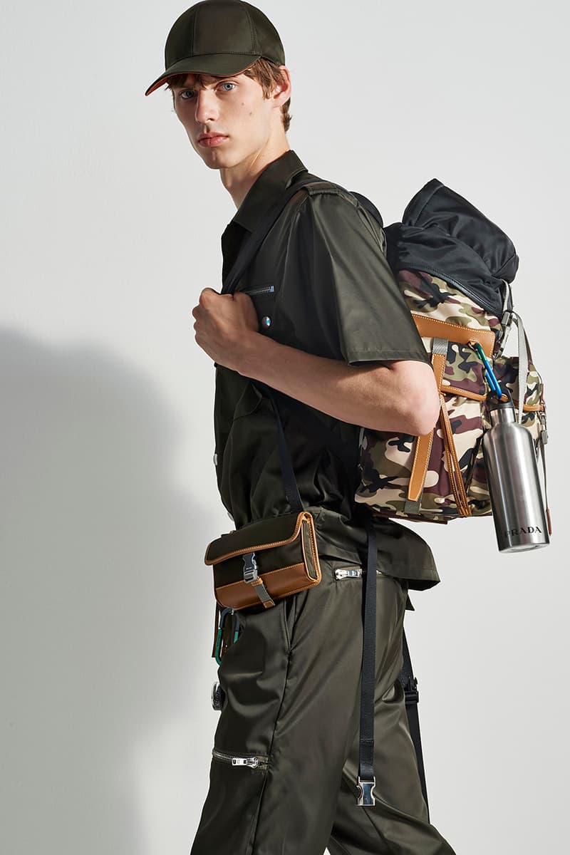 prada escape selfridges apparel sneakers camouflage shirts boots accessories water bottles outdoor practical themed design store space first look buy cop purchase