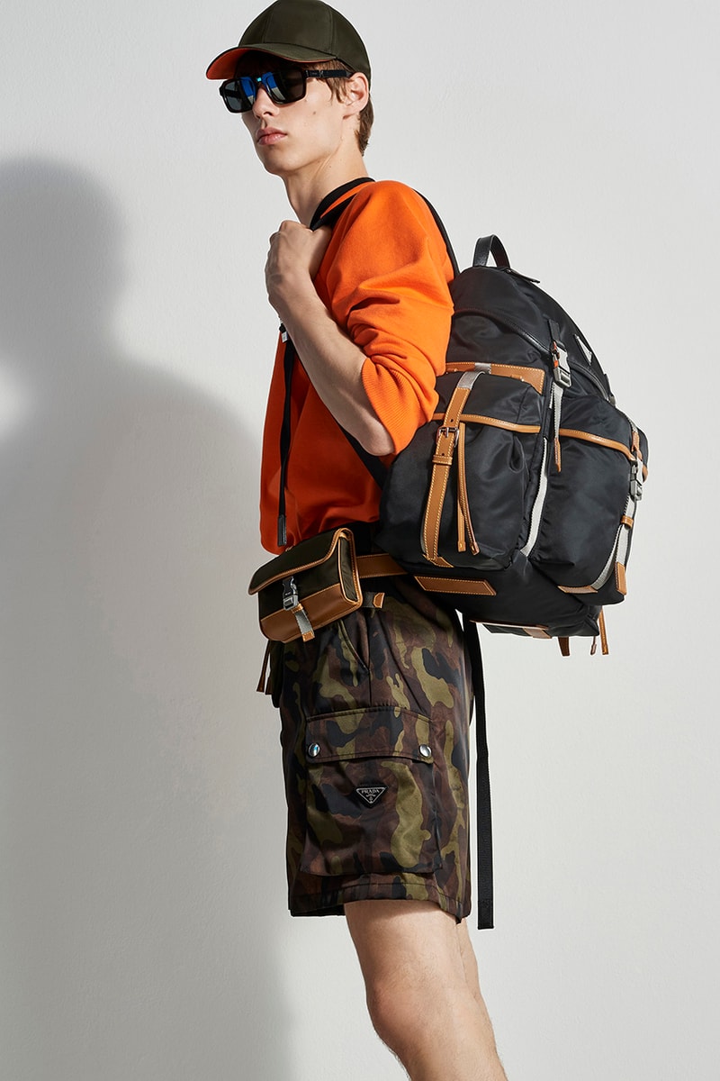 prada escape selfridges apparel sneakers camouflage shirts boots accessories water bottles outdoor practical themed design store space first look buy cop purchase