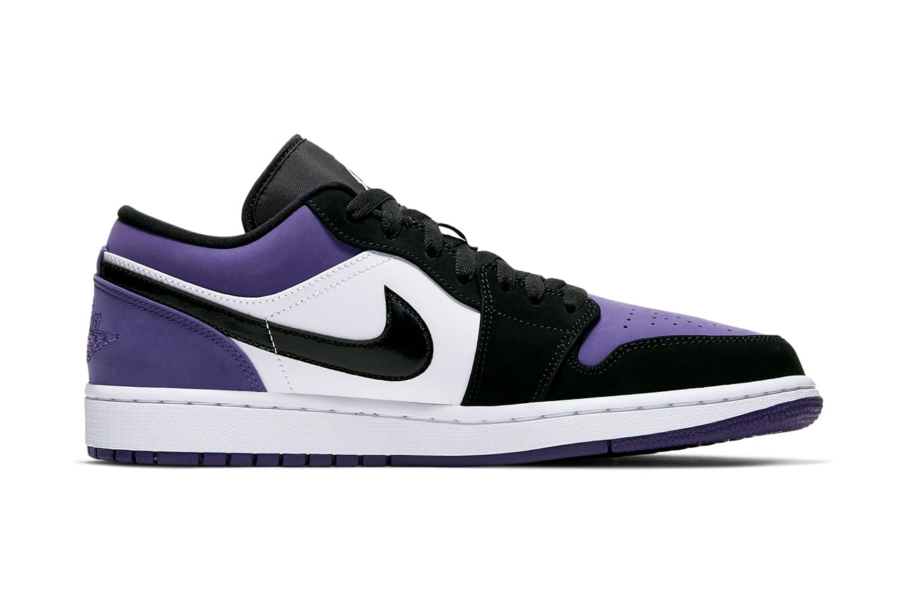 black and white jordans with purple logo