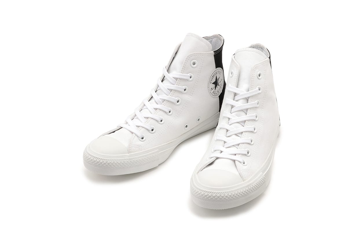 half black half white converse shoes