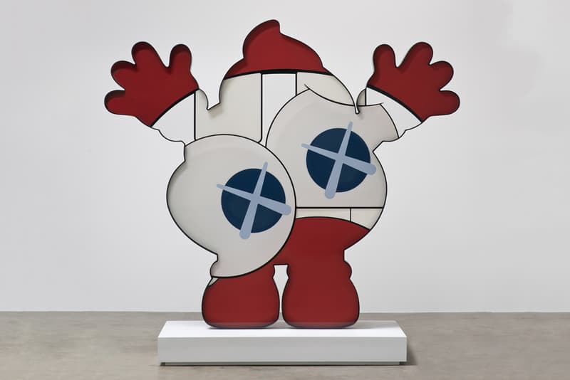 kaws he eats alone exhibition doha fire station museum qatar artworks paintings companion sculptures