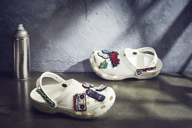 Ruby Rose x Crocs Classic Clog Release limited edition batwoman all white distressed look spray paint cans Jibbitz™ charms