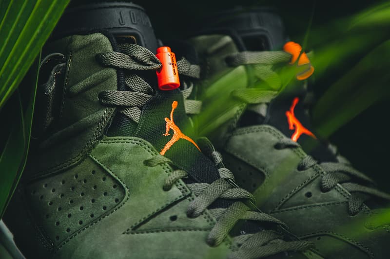 travis scott air jordan brand 6 cactus jack closer look buy cop purchase raffle olive green red infrared branding white black translucent midsole glow in the dark hbx dover street market la flame