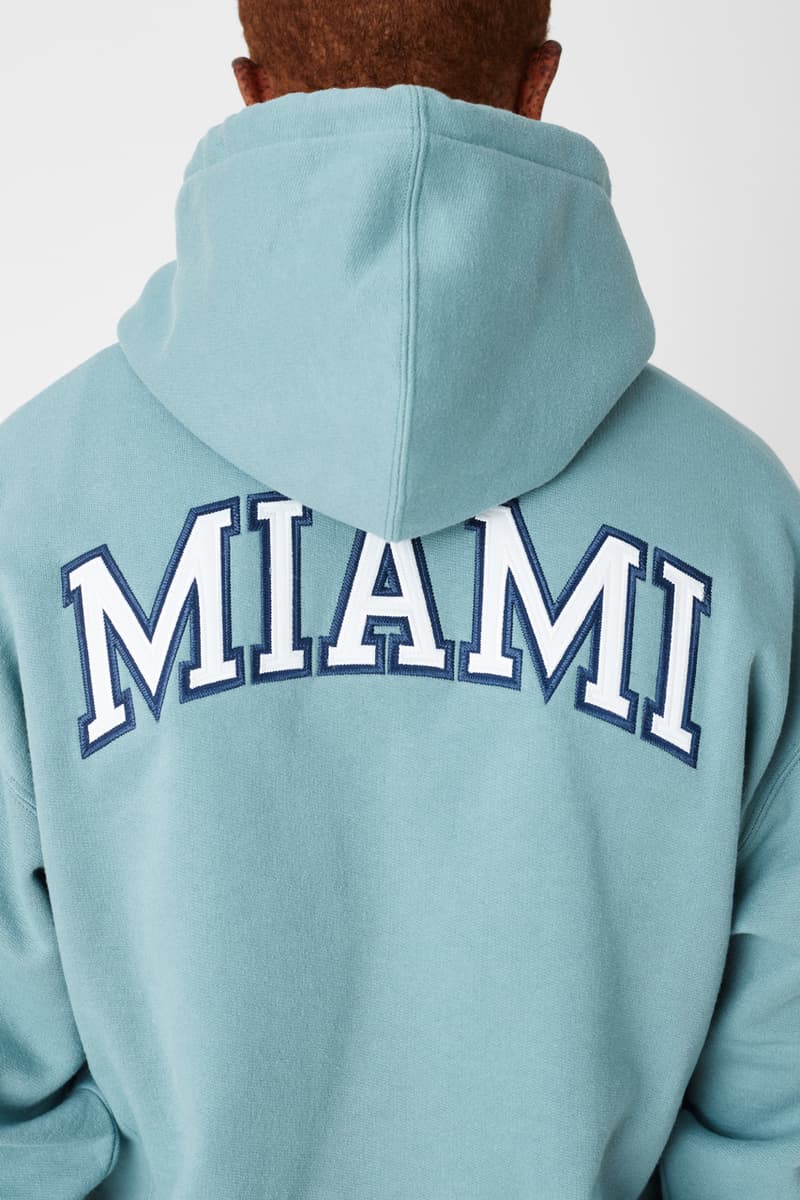 kith vogue russell athletic love thy city collaboration collection release collegiate varsity jacket brooklyn miami soho los angeles flagship stores hoodies crewnecks sweatpants tshirts 