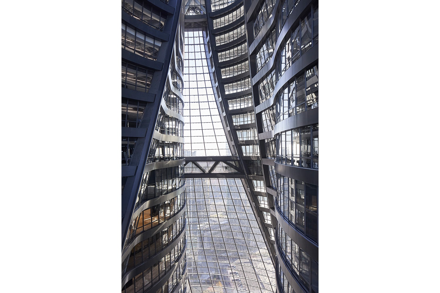 Zaha Hadid Architects Leeza SOHO Opening world's tallest atrium beijing buildings architecture pictures gallery LEED Gold certification 45-story sustainability environment pas de deux