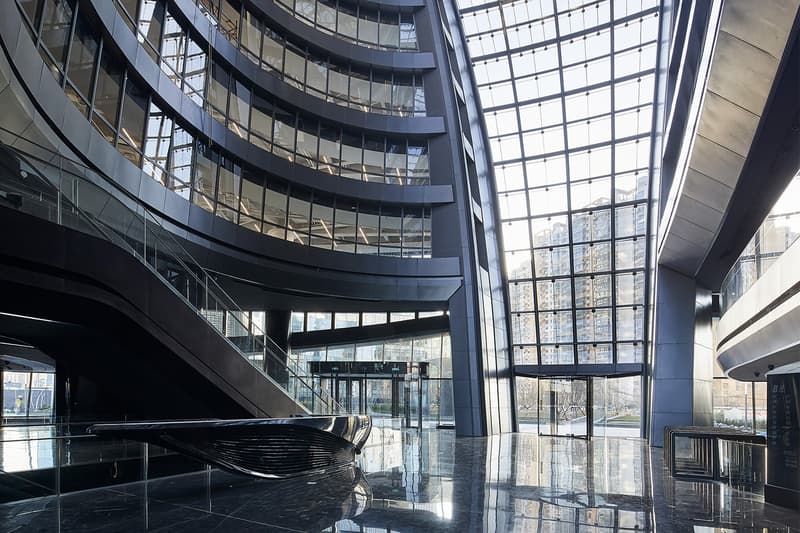 Zaha Hadid Architects Leeza SOHO Opening world's tallest atrium beijing buildings architecture pictures gallery LEED Gold certification 45-story sustainability environment pas de deux