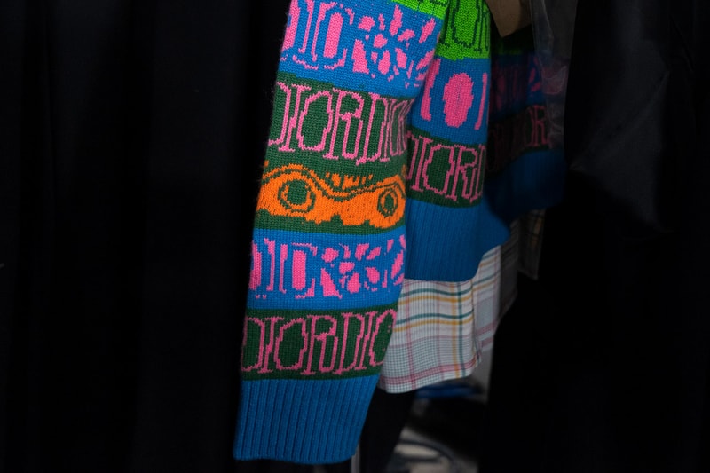Backstage at Diors Fall Winter 2020 Miami Preview shawn stussy beach architecture couturier yoon ahn ambush jewelry French luxury house American art basel collaboration logo saddle bag pre
