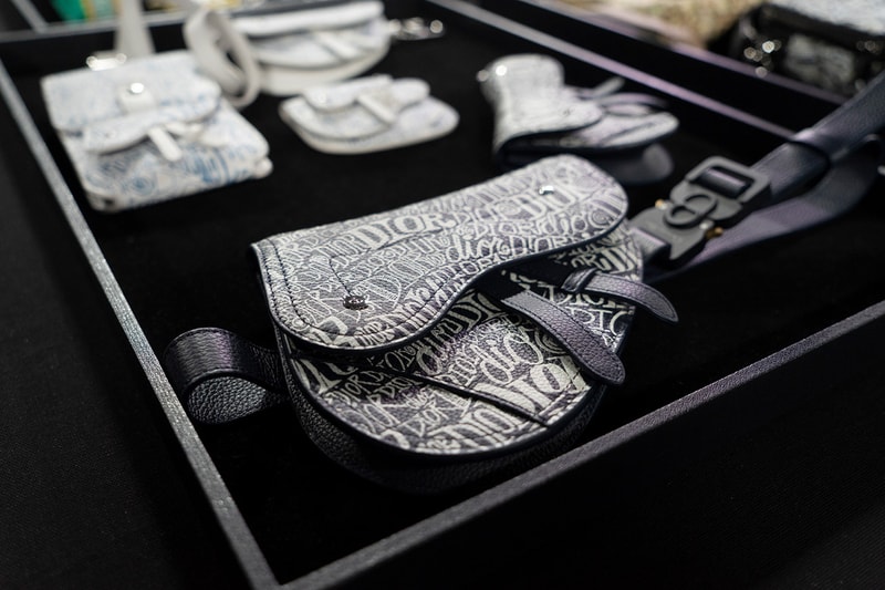 Backstage at Diors Fall Winter 2020 Miami Preview shawn stussy beach architecture couturier yoon ahn ambush jewelry French luxury house American art basel collaboration logo saddle bag pre