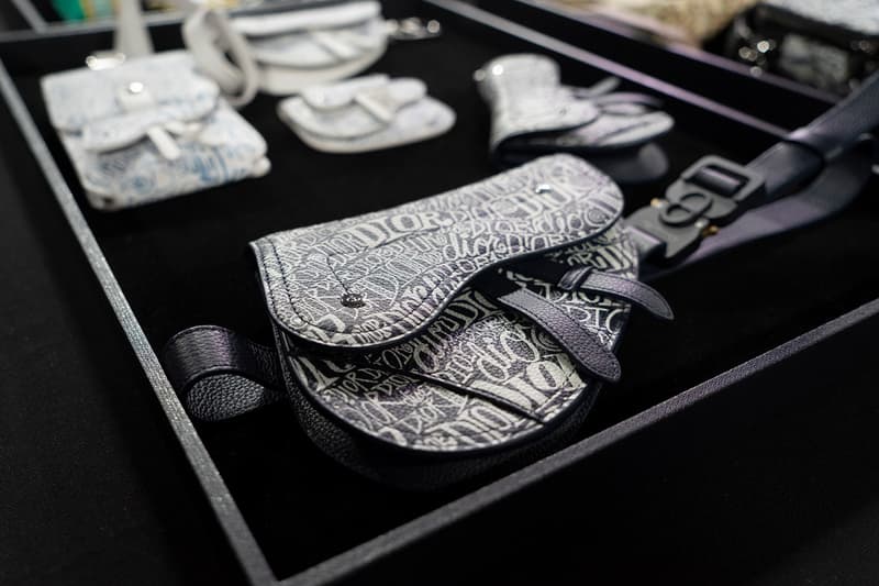 Backstage at Diors Fall Winter 2020 Miami Preview shawn stussy beach architecture couturier yoon ahn ambush jewelry French luxury house American art basel collaboration logo saddle bag pre