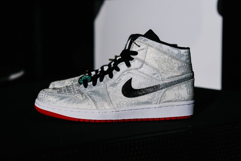 Edison Chen CLOT Jordan 1 Mid SE Fearless Collection Yin and Yang peel-off uppers internalism externalism Jordan Brand's Fearless Ones Air Jordan 1 collection tonal graphics silver woven silk fadeway stitched Swoosh black flat laces white midsole Jumpman tongue logos contrasting red rubber outsole