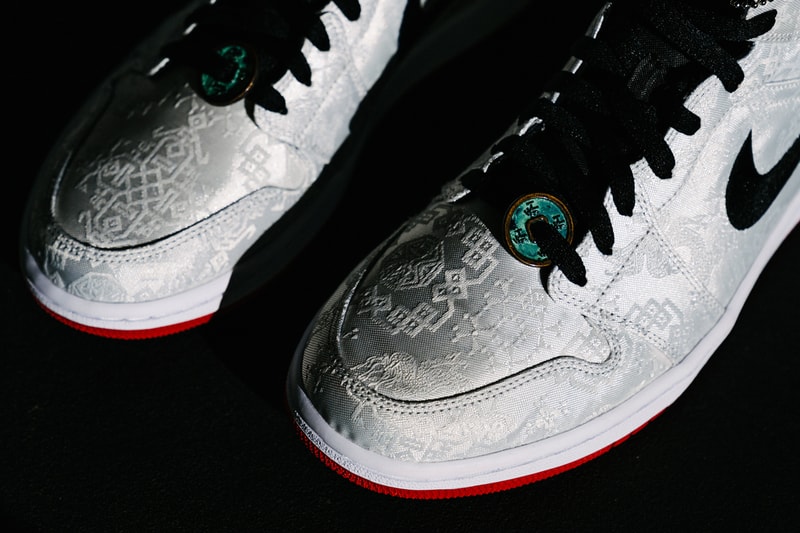 Edison Chen CLOT Jordan 1 Mid SE Fearless Collection Yin and Yang peel-off uppers internalism externalism Jordan Brand's Fearless Ones Air Jordan 1 collection tonal graphics silver woven silk fadeway stitched Swoosh black flat laces white midsole Jumpman tongue logos contrasting red rubber outsole