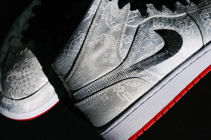 Edison Chen CLOT Jordan 1 Mid SE Fearless Collection Yin and Yang peel-off uppers internalism externalism Jordan Brand's Fearless Ones Air Jordan 1 collection tonal graphics silver woven silk fadeway stitched Swoosh black flat laces white midsole Jumpman tongue logos contrasting red rubber outsole