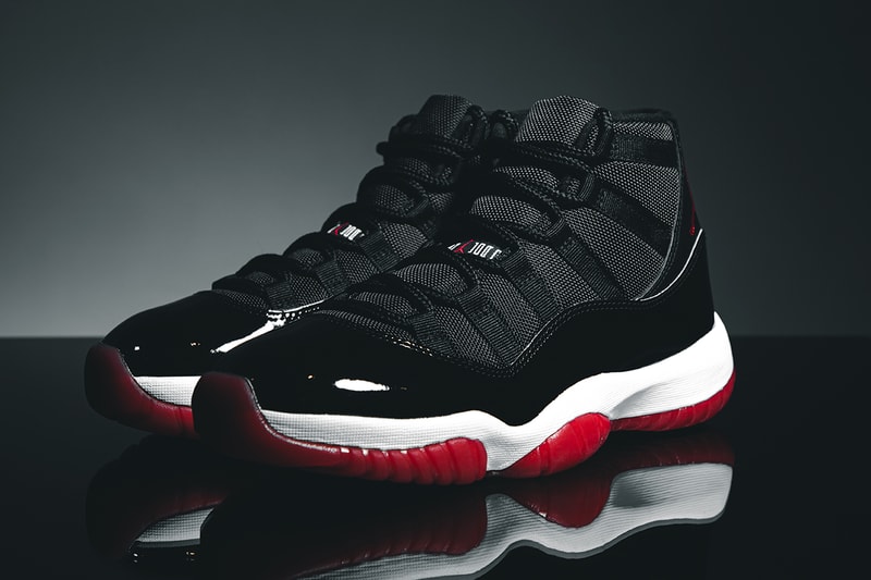 Nike Air Jordan 11 "Bred" Closer Look Editorial 2019 HYPEBEAST In Hand Footwear MJ Michael Jordan Basketball 1996 Recreation Drop SNKRS App Release Information #23 Patent Leather Black Red White