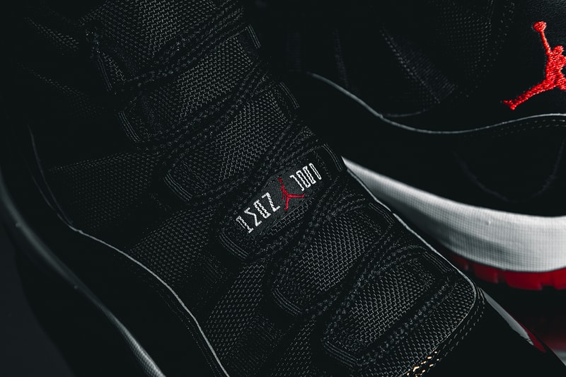 Nike Air Jordan 11 "Bred" Closer Look Editorial 2019 HYPEBEAST In Hand Footwear MJ Michael Jordan Basketball 1996 Recreation Drop SNKRS App Release Information #23 Patent Leather Black Red White