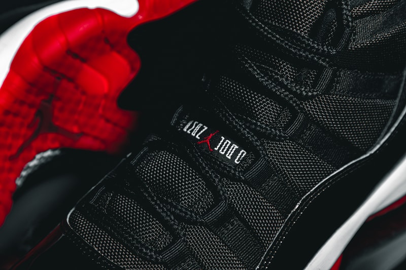 Nike Air Jordan 11 "Bred" Closer Look Editorial 2019 HYPEBEAST In Hand Footwear MJ Michael Jordan Basketball 1996 Recreation Drop SNKRS App Release Information #23 Patent Leather Black Red White