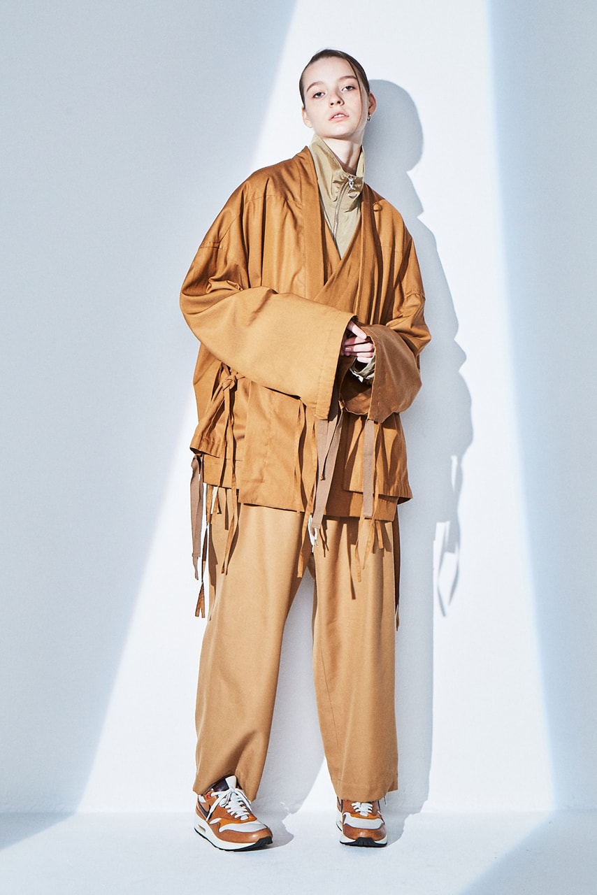 ANEI Fall/Winter 2020 Lookbook Collection Jackets Coats Trousers Blazers Knitwear T-shirts Shirts Black Blue White Gray Brown White Dresses Burnt Orange Scarves Yellow Green Bags