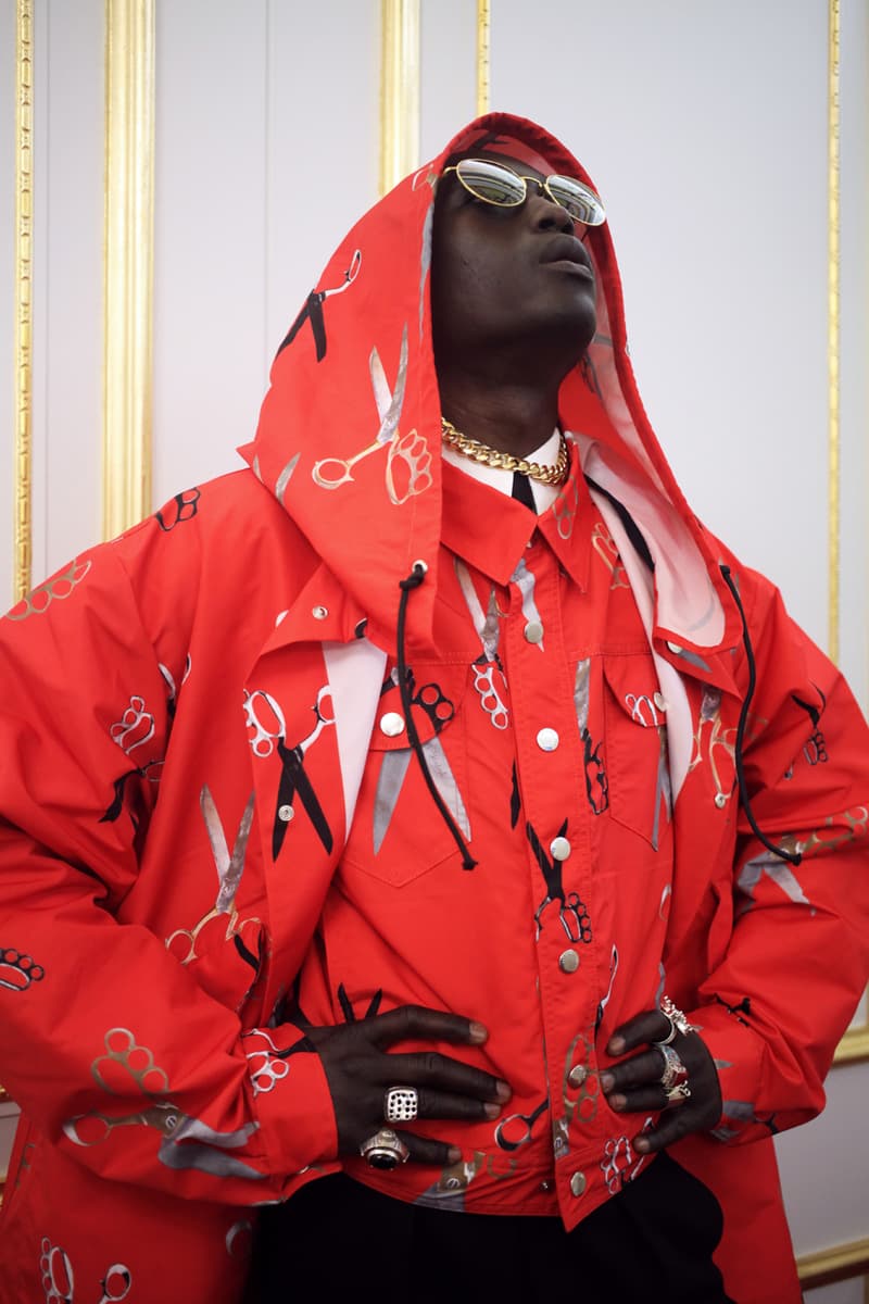 Art Comes First Fall/Winter 2020 Lookbook Collection Paris Fashion Week Coats Pants Jackets Skull Scissors Black Red Yellow Hats Jewelry Rings Chains Gold Silver Crewnecks Knitwear "Exhibition"