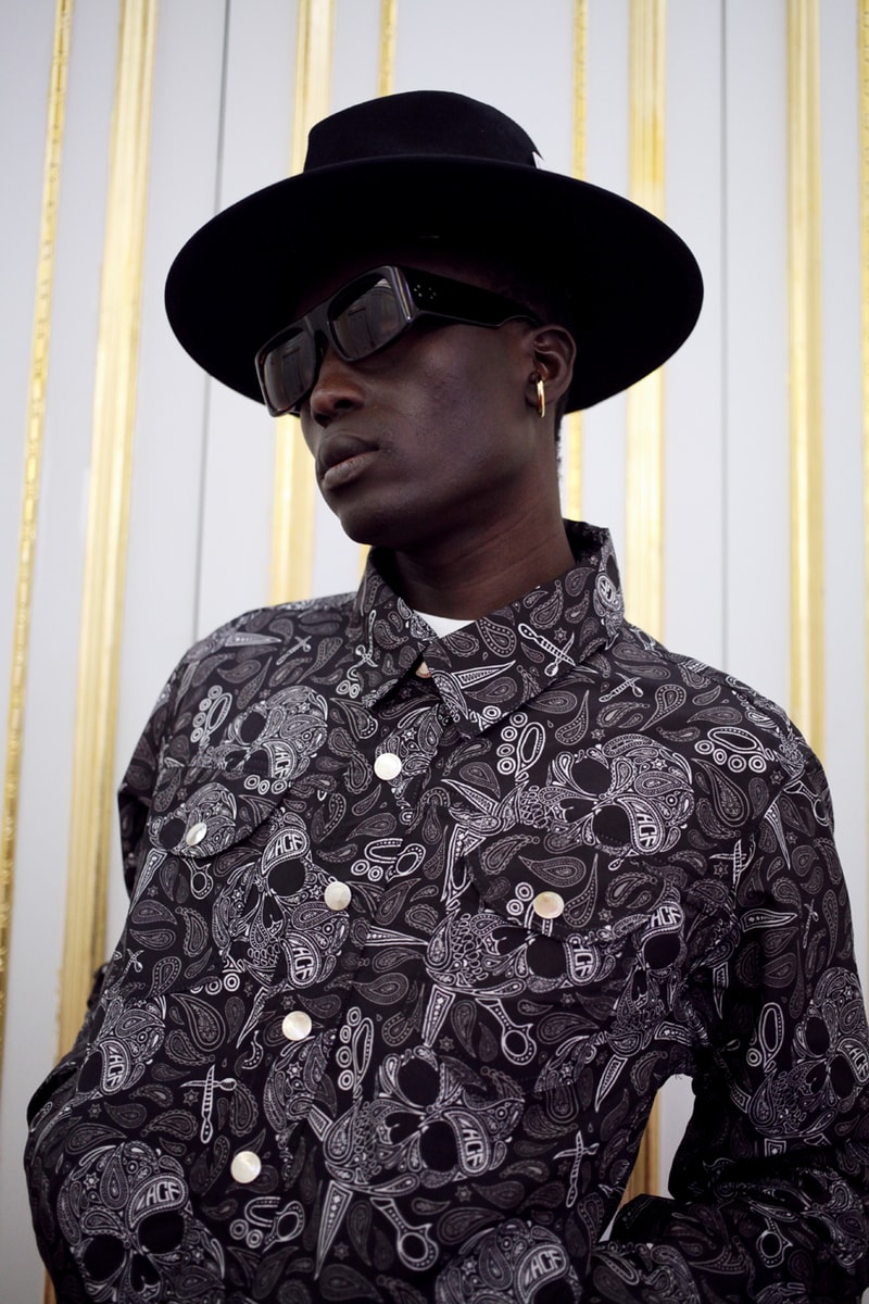 Art Comes First Fall/Winter 2020 Lookbook Collection Paris Fashion Week Coats Pants Jackets Skull Scissors Black Red Yellow Hats Jewelry Rings Chains Gold Silver Crewnecks Knitwear "Exhibition"