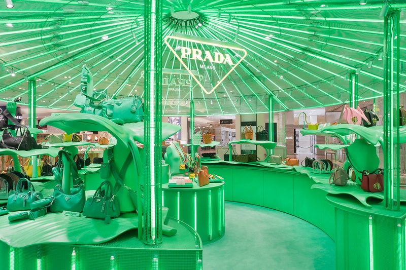 Prada Takes Over Galeries Lafayette Hyper Leaves Retail Installation paris fall winter 2020 collection footwear nature tropical neon green signs