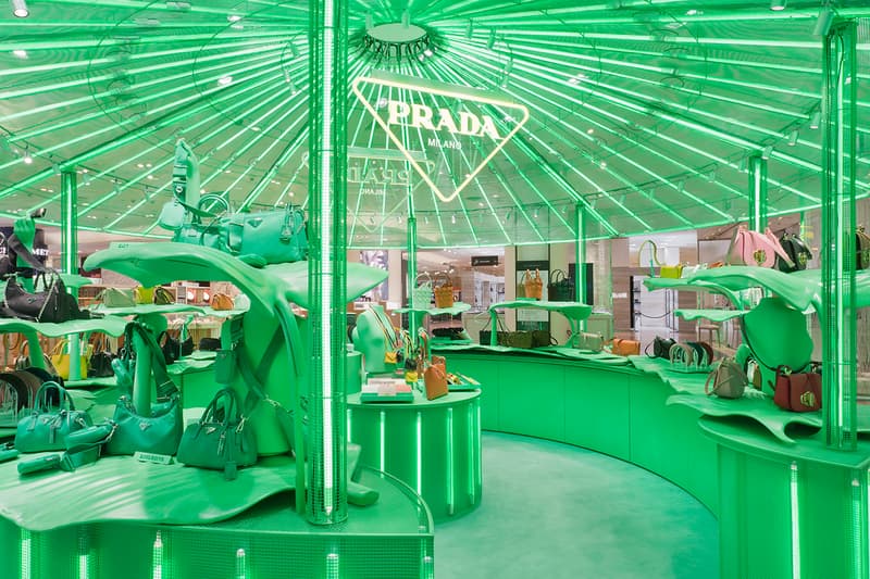 Prada Takes Over Galeries Lafayette Hyper Leaves Retail Installation paris fall winter 2020 collection footwear nature tropical neon green signs