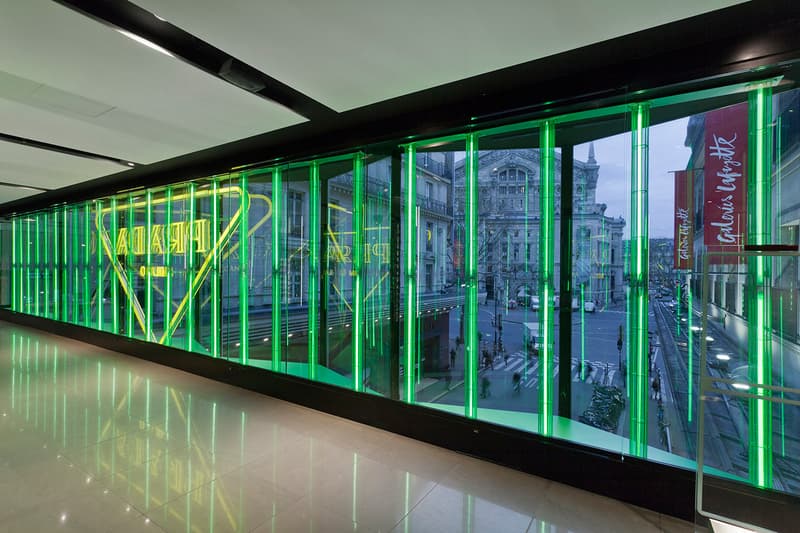 Prada Takes Over Galeries Lafayette Hyper Leaves Retail Installation paris fall winter 2020 collection footwear nature tropical neon green signs